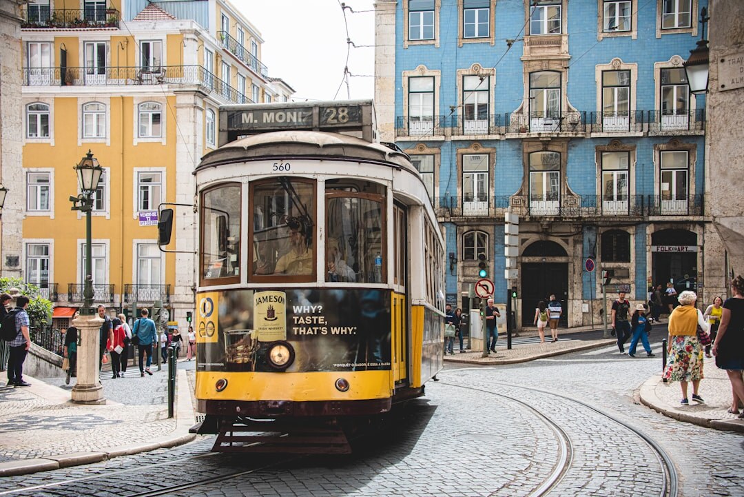 Lisbon skyline with traditional yellow tram